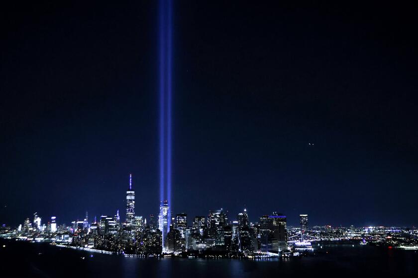 NEW YORK, NEW YORK - SEPTEMBER 11: The Tribute In Light shines up from Lower Manhattan on September 11, 2021 in New York City. The nation is marking the 20th anniversary of the terror attacks of September 11, 2001, when the terrorist group al-Qaeda flew hijacked airplanes into the World Trade Center, Shanksville, PA and the Pentagon, killing nearly 3,000 people. (Photo by Chip Somodevilla/Getty Images)