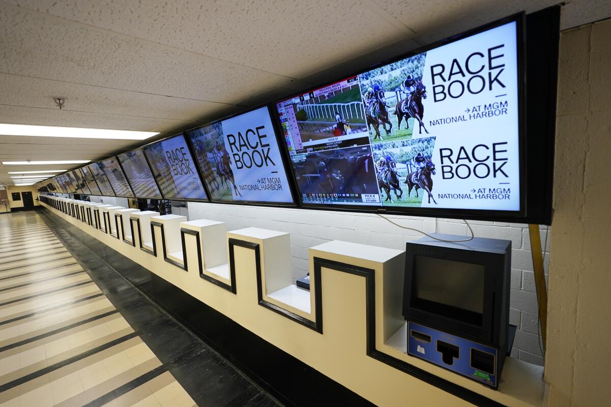 Betting windows are empty at Pimlico racetrack in Baltimore on Friday