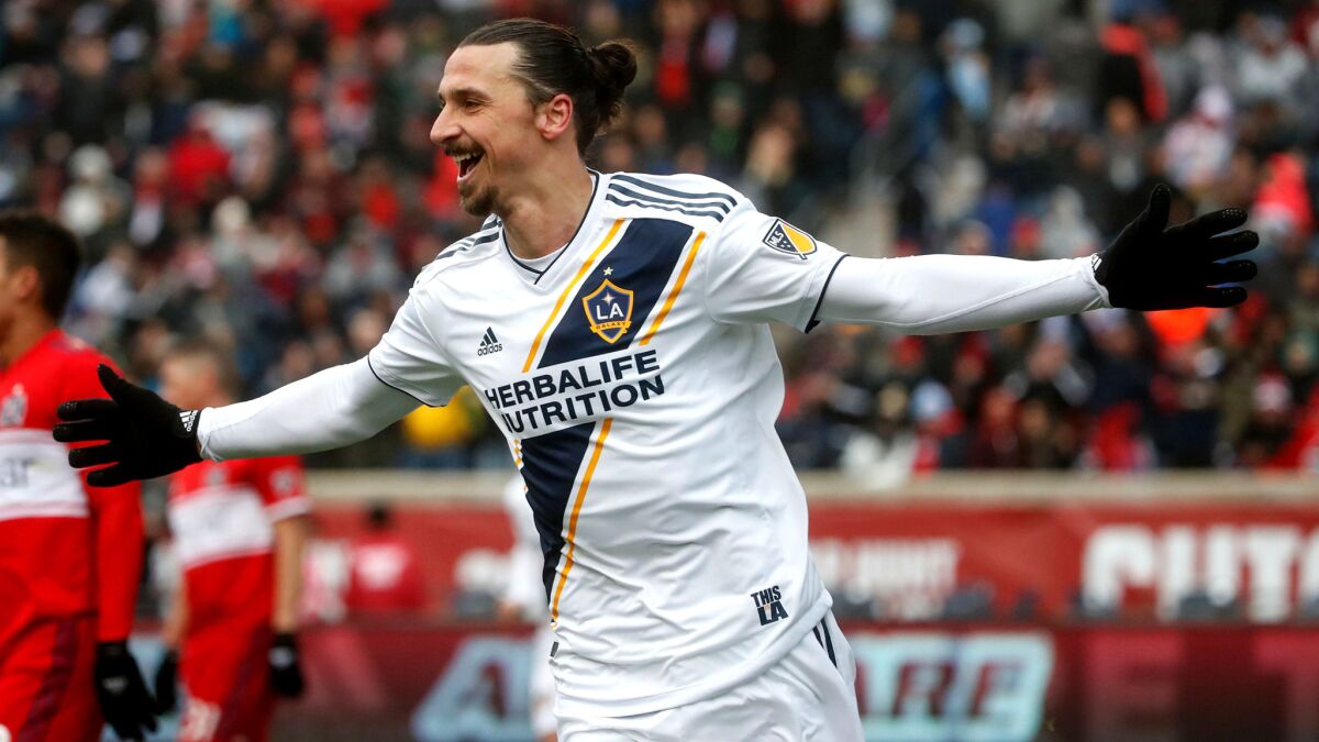 Zlatan Ibrahimovic celebrates after scoring against the Fire during the first half Saturday in Chicago.