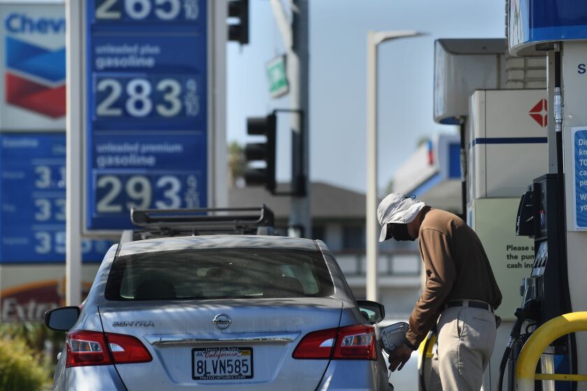 TORRANCE, CALIFORNIA JUNE 16, 2020-A cusotmer puts gas in his tank at an Arco station in Torrance Tuesday. California's gas tax is set to increase for the third time in four years. (Wally Skalij/Los Angeles Times)