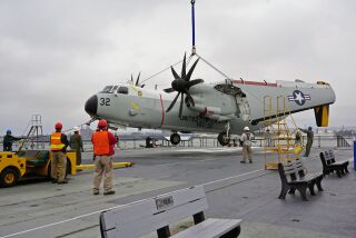 A restored Navy C-2A Greyhound “Carrier Onboard Delivery” aircraft was recently added to the USS Midway Museum.