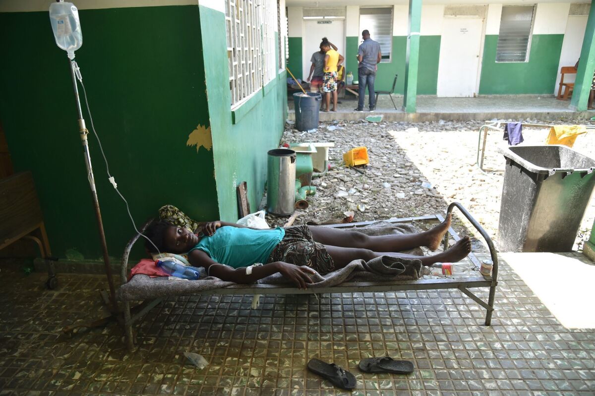 A cholera patient is treated at the Les Anglais health center in Les Cayes in southwest Haiti.