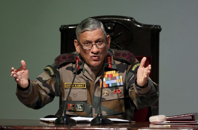 FILE- Indian Army Chief Bipin Rawat speaks during a press conference in New Delhi, India, Jan.12, 2018. India’s air force says an army helicopter carrying the country’s military chief has crashed in southern Tamil Nadu state. The air force did not say whether Chief of Defense Staff Bipin Rawat was injured in the accident Tuesday. (AP Photo, File)