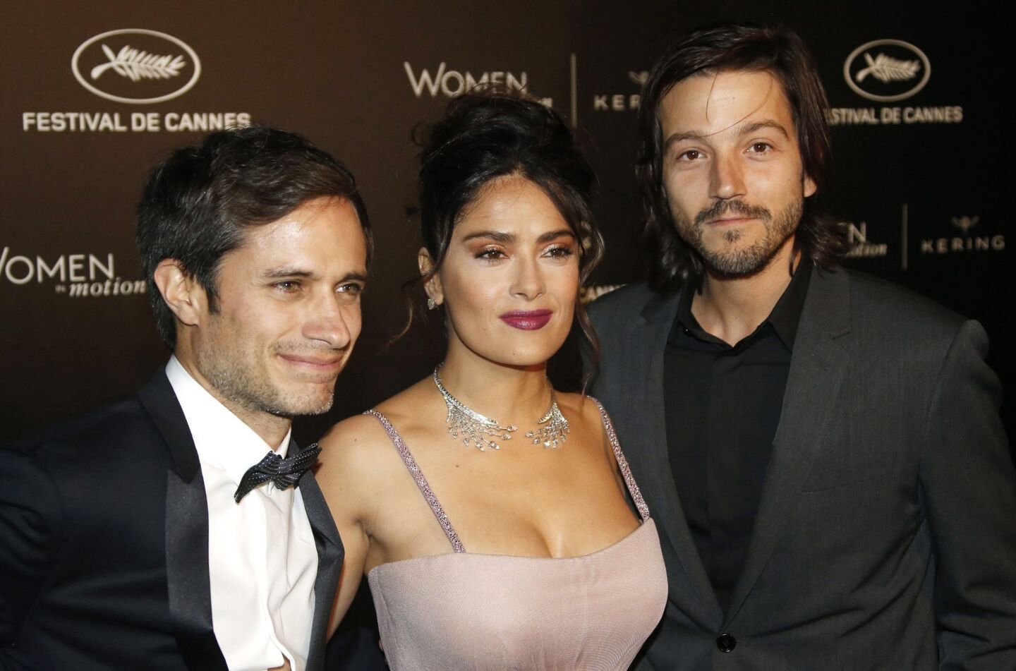 Actors Gael Garcia Bernal, Salma Hayek and Diego Luna arrive for the Kering Women in Motion Honor Awards.
