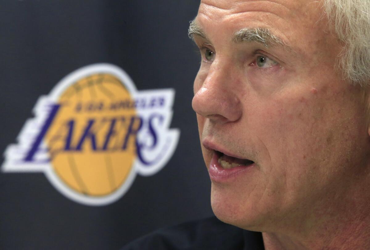 Lakers General Manager Mitch Kupchak answers questions at a new conference about the upcoming season on Sept. 26.