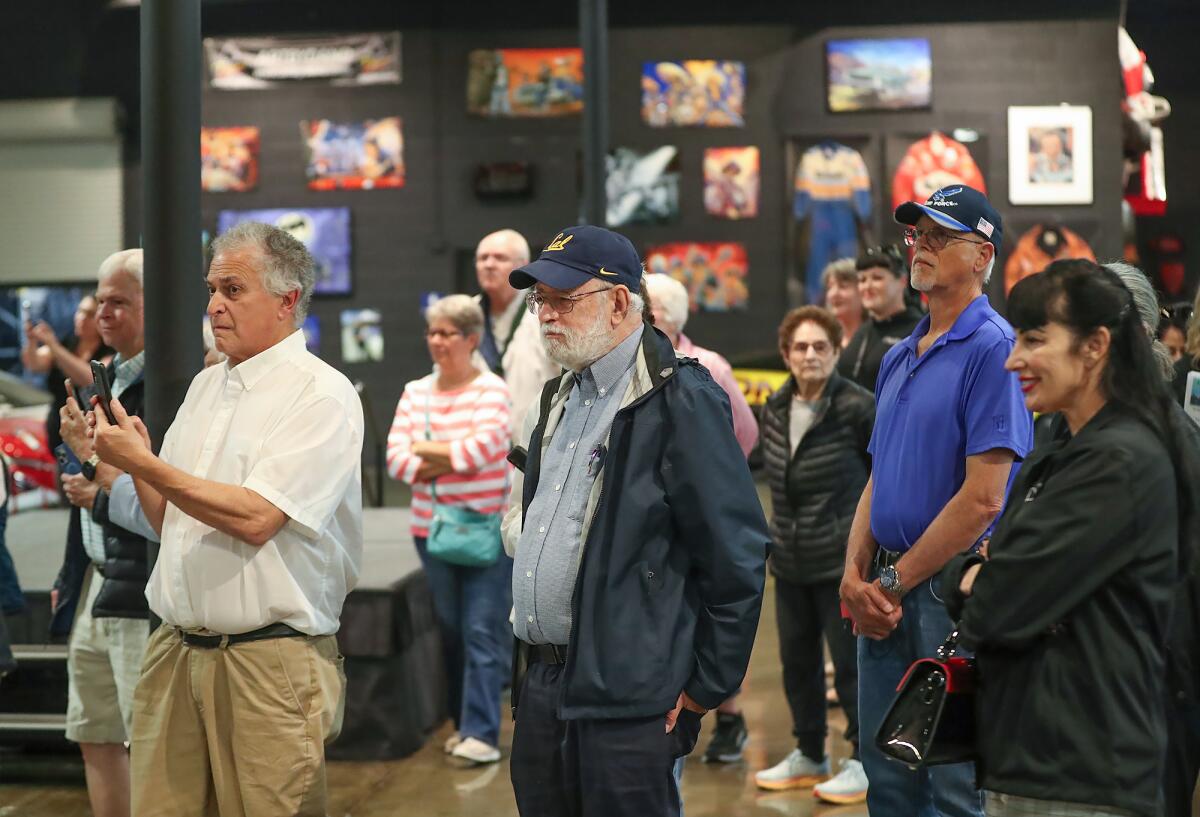Members of LIFT, a social support network for widows and widowers, take a tour of the Marconi Automotive Museum in Tustin.