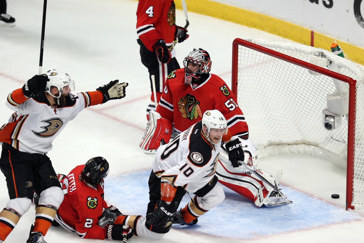 Ducks forward Corey Perry scores on Blackhawks goalie Corey Crawford in the third period of Game 4 of the Western Conference finals.