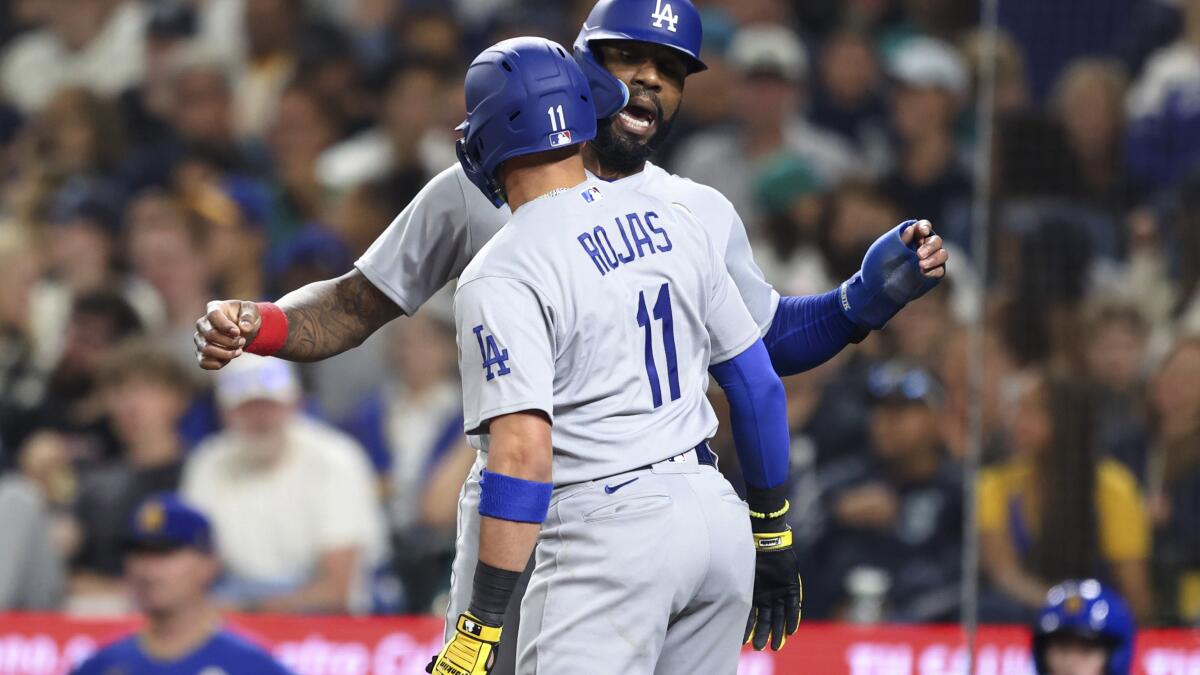 Dodgers top M's in extras, secure NL West title