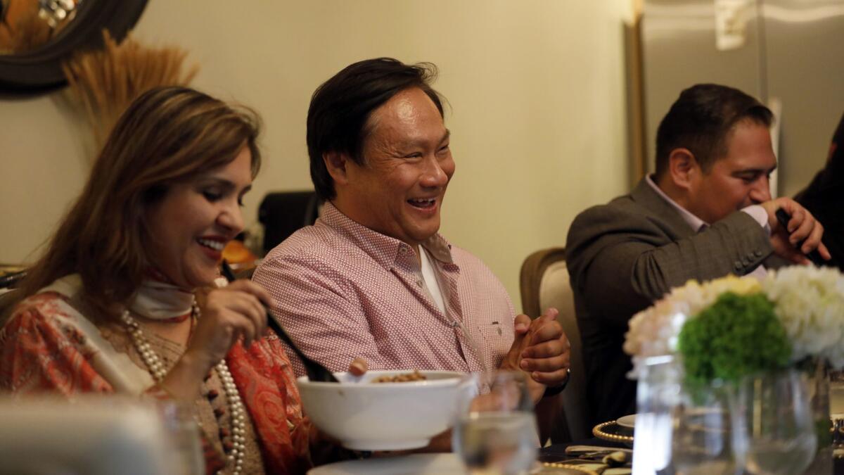 Amna Qazi, from left, Tom Chang, Ernesto Hidalgo and Veronica Perez participate in an embRACE L.A. dinner.