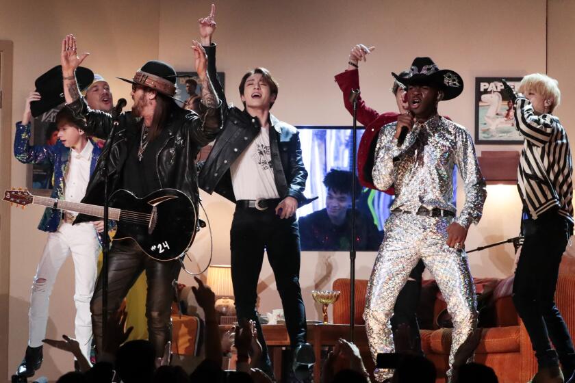 LOS ANGELES, CA - January 26, 2020: Lil Nas X, Billy Ray Cyrus, Mason Ramsey, and BTS perform at the 62nd GRAMMY Awards at STAPLES Center in Los Angeles, CA. (Robert Gauthier / Los Angeles Times)