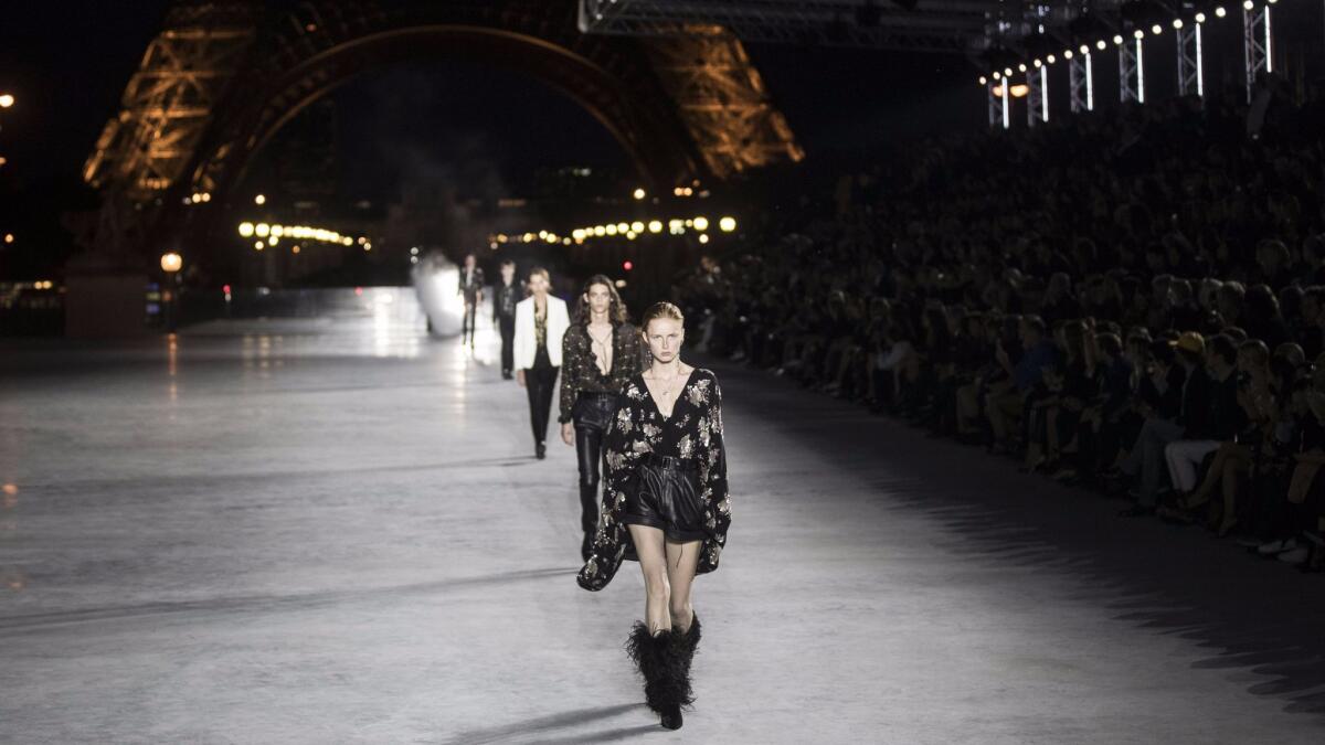 The finale of the spring and summer 2018 runway collection show presented against the backdrop of the Eiffel Tower on Sept. 26 during Paris Fashion Week.