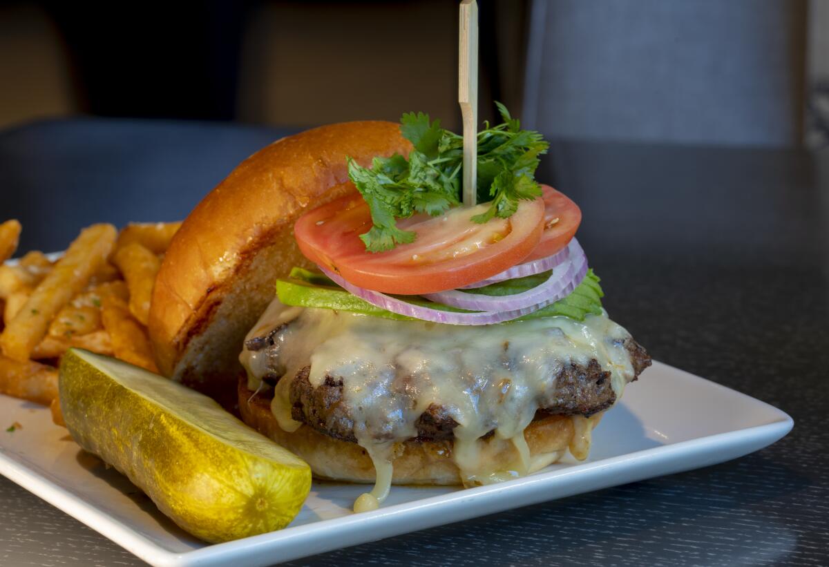 Patties & Pints, at Valley View, offers a San Diego burger with a kick, topping it with a jalapeño relish, as well as avocado, tomato, red onion, cilantro and pepper Jack cheese on a brioche bun.