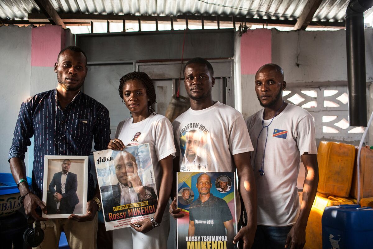 Mireille Kanku Tshimanga, second from left, with activists from Collectif 2016. Her brother Rossy Mukendi was shot and killed by police during a peaceful demonstration on Feb. 25, 2018. His death became a rallying cry for the other pro-democracy youth groups.
