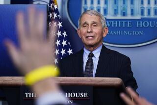 Dr. Anthony Fauci fields media questions at the White House on Thursday.