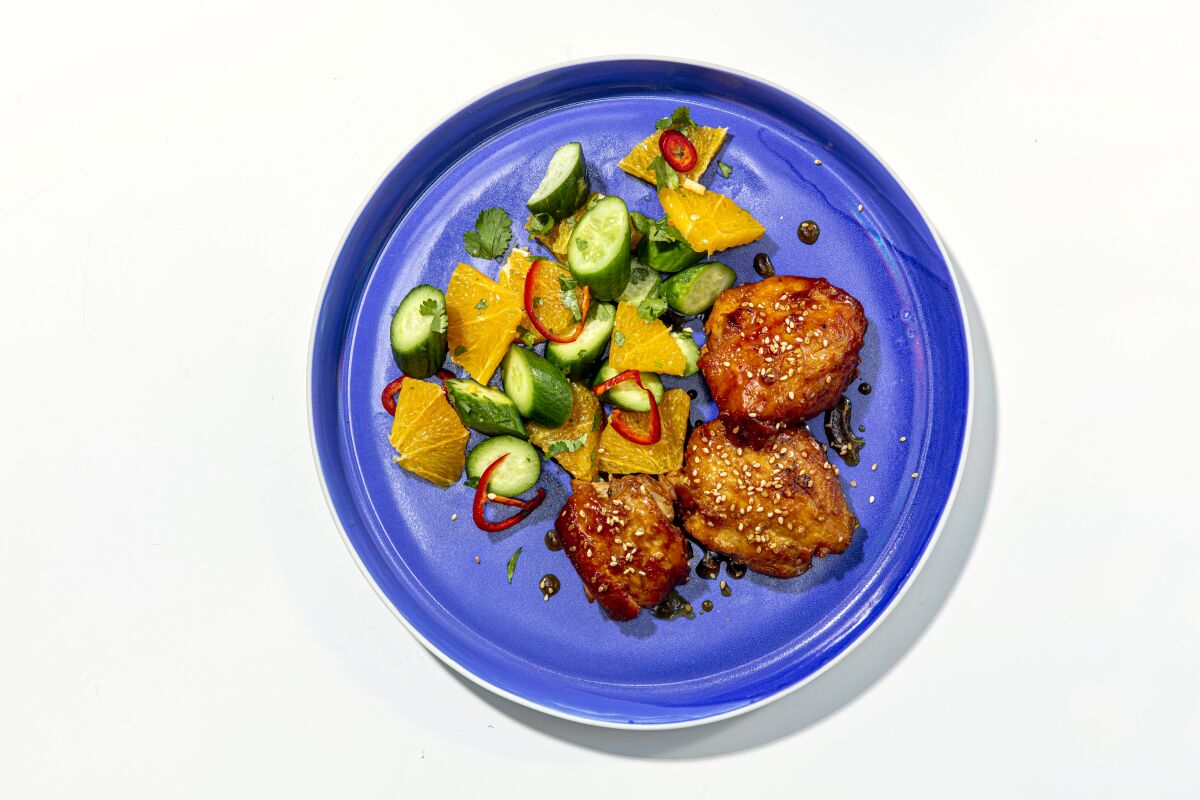Overhead photo of chicken and veggies on a plate