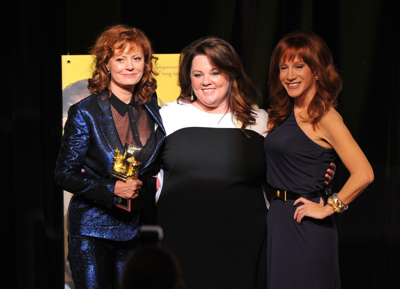 Susan Sarandon, Melissa McCarthy and Kathy Griffin pose together following Sarandon's acceptance of her lifetime achievement award.
