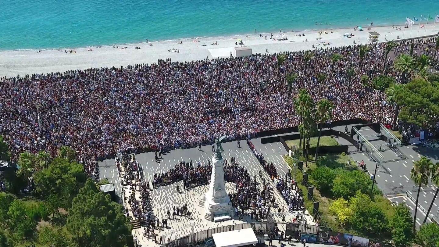 Thousands gather on Monday on the Jardin Albert and the Promenade des Anglais in Nice to observe a minute of silence for victims of the deadly attack.