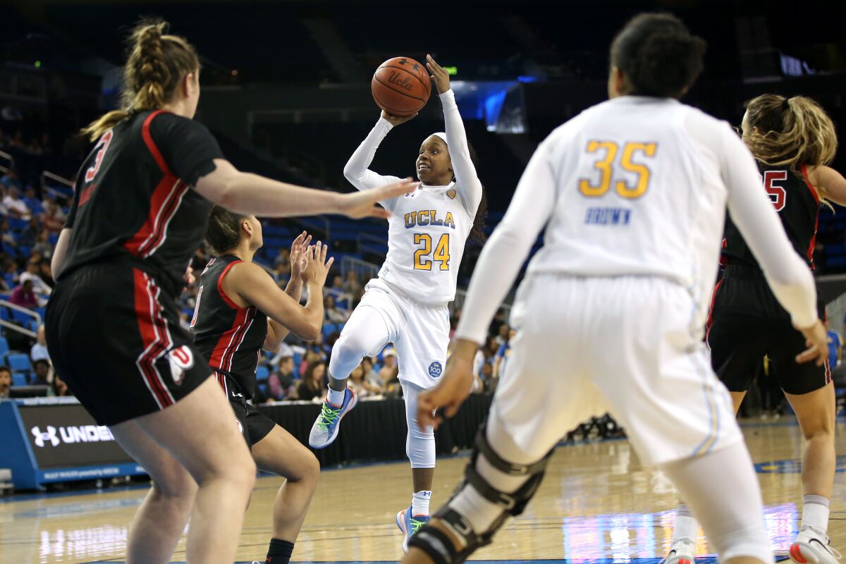 UCLA's Japreece Dean takes a shot during the Bruins' 77-54 victory over Utah at Pauley Pavilion on Sunday.