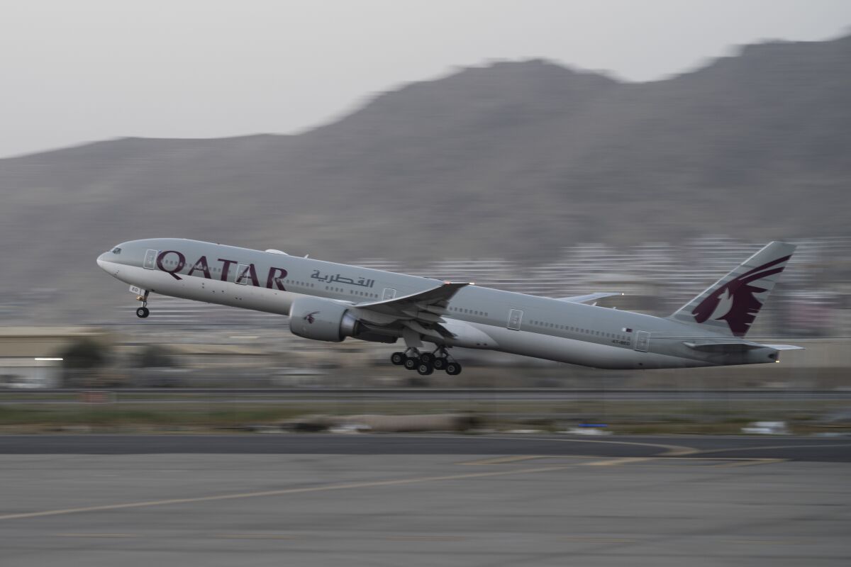 Qatar Airways aircraft takes off with foreigners from the airport in Kabul