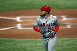 ARLINGTON, TEXAS - SEPTEMBER 10: Jared Walsh #25 of the Los Angeles Angels after hitting a three-run home run.