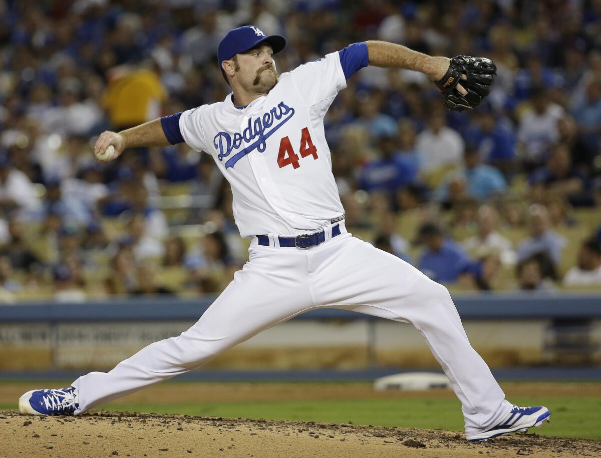 Dodgers reliever Chris Withrow, shown during the NLCS in October, has been told by a team doctor that he needs Tommy John surgery.