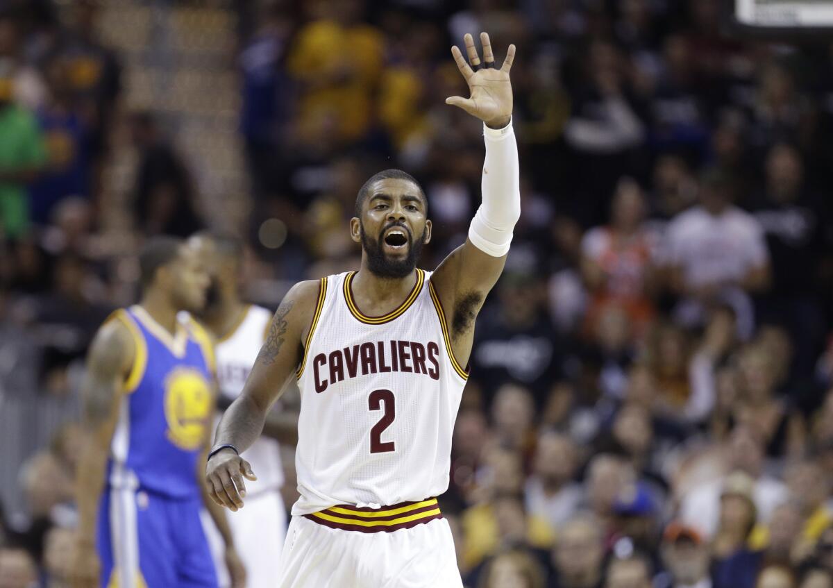 Cavaliers guard Kyrie Irving reacts after a play during the NBA Finals.