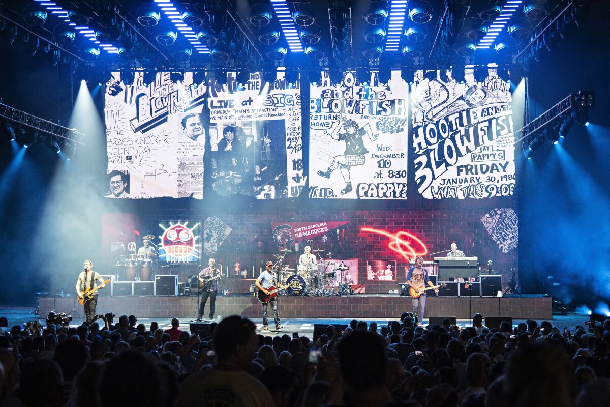 FILE - Hootie and the Blowfish performs during the Group Therapy Tour at Riverbend Music Center on July 20, 2019, in Cincinnati. Band member Rick Noble on Friday, June 3, 2022, donated his collection of all things Hootie & the Blowfish, including CDs, ticket stubs, an autographed guitar and T-shirts, to the University of South Carolina, where the band was formed in 1986. (Photo by Amy Harris/Invision/AP, File)