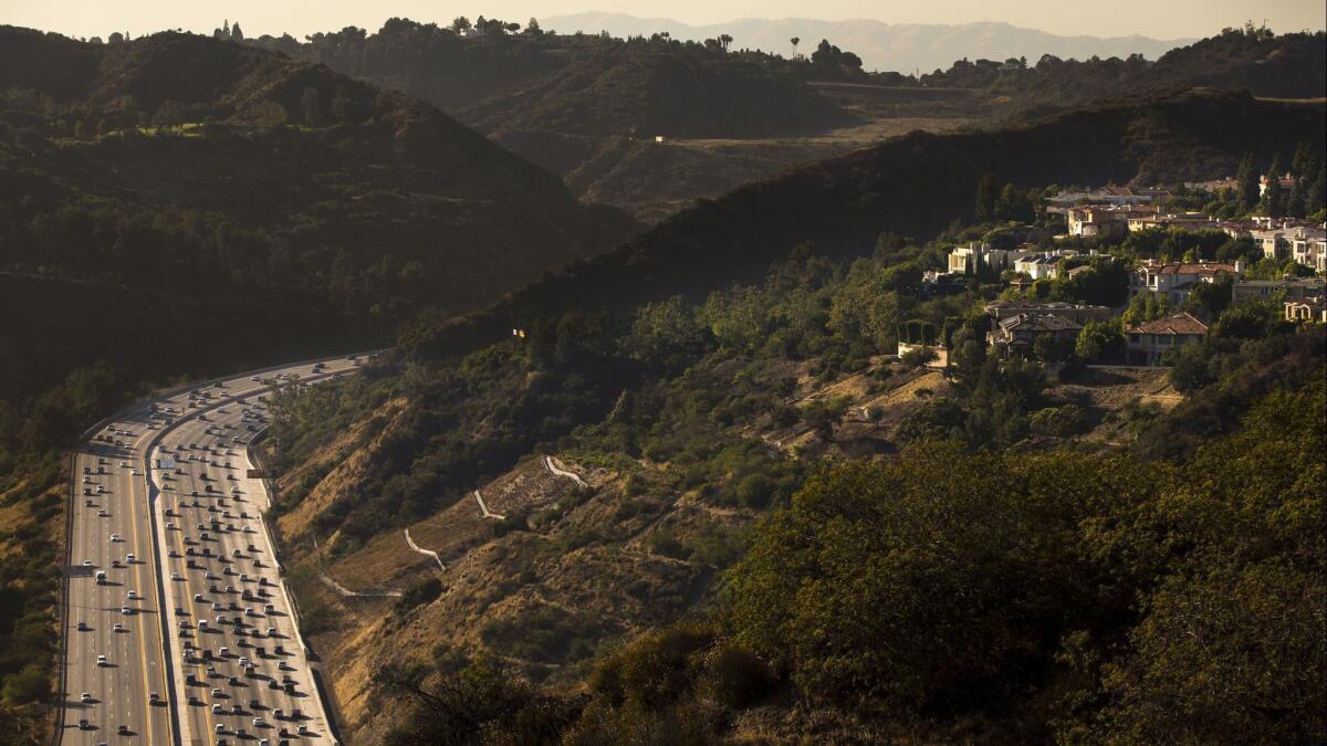 Traffic streams through the Sepulveda Pass, one of Southern California's most infamous bottlenecks. Metro says a new rail line could whisk commuters through the mountains and into West L.A. in 20 minutes.