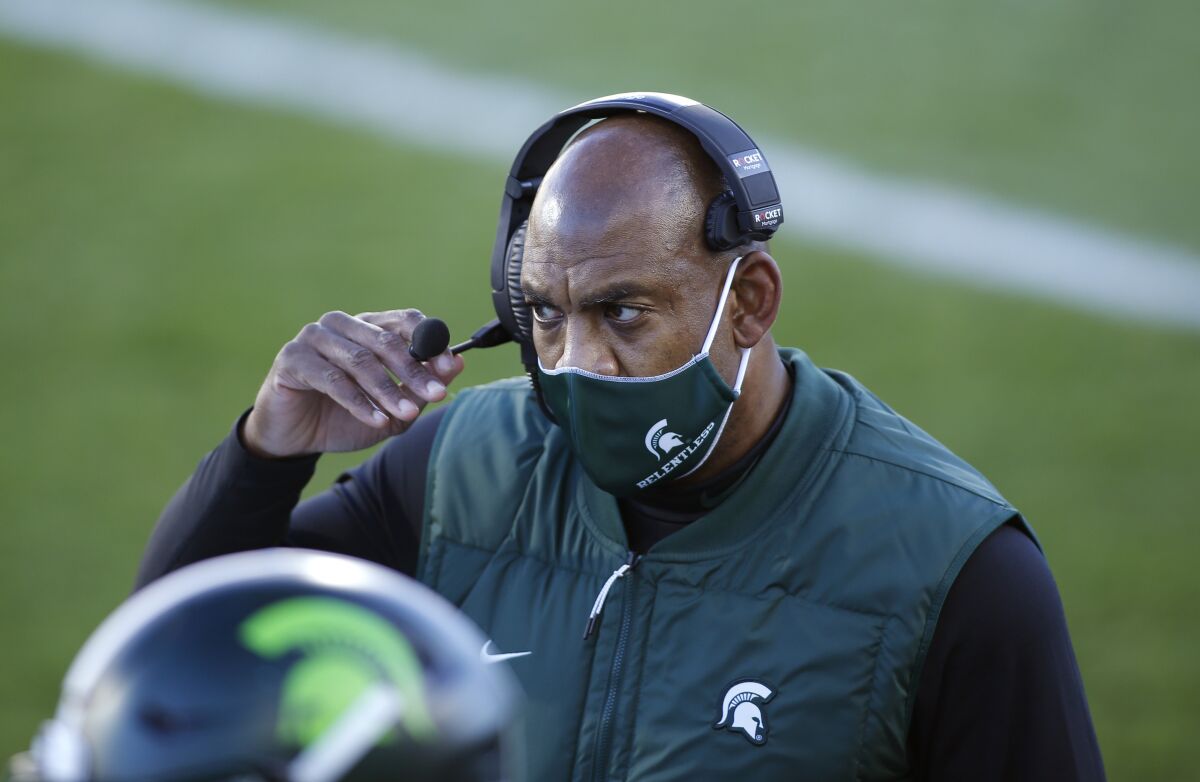 Michigan State coach Mel Tucker looks on during the first quarter of an NCAA college football game against Northwestern, Saturday, Nov. 28, 2020, in East Lansing, Mich. (AP Photo/Al Goldis)