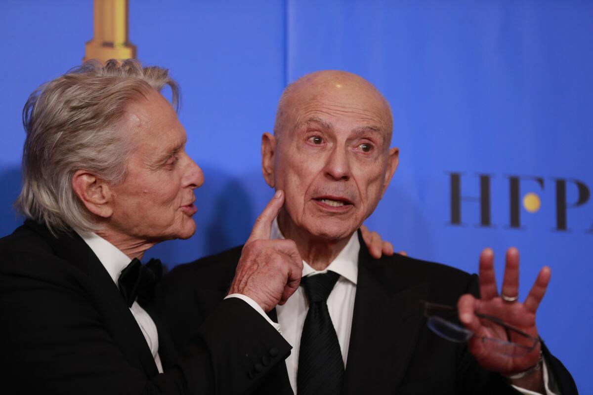 Michael Douglas, left, and Alan Arkin stars of Netflix's "The Kominsky Method," after the show won the Golden Globe for musical or comedy TV series.