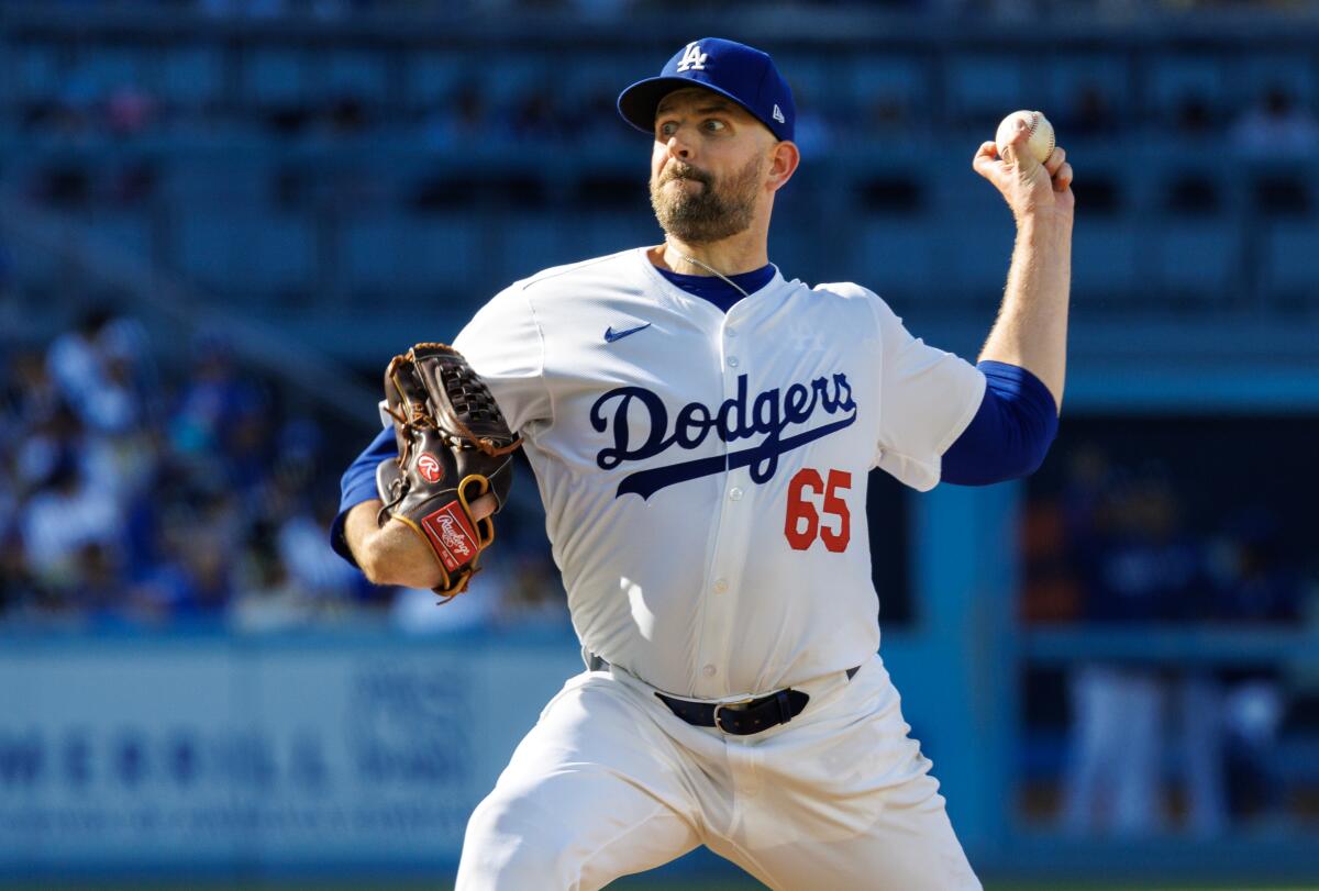 Dodgers pitcher James Paxton delivers against the Boston Red Sox at Dodger Stadium on Sunday.