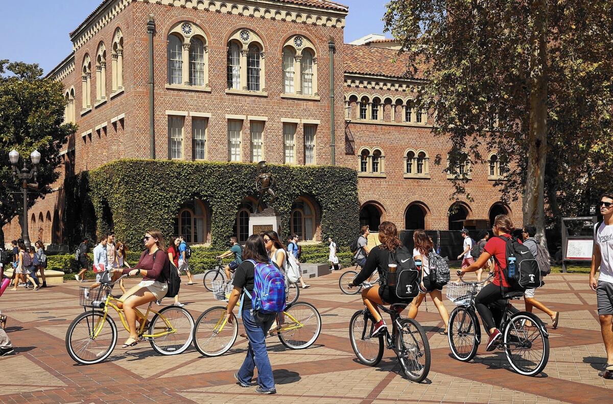 Students at the campus of USC head to classes.