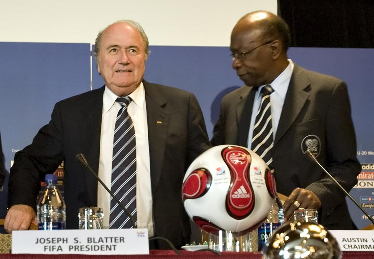 Jack Warner, right, says he has documents and checks that link FIFA officials, including embattled President Sepp Blatter, left, to the 2010 election in Trinidad and Tobago.