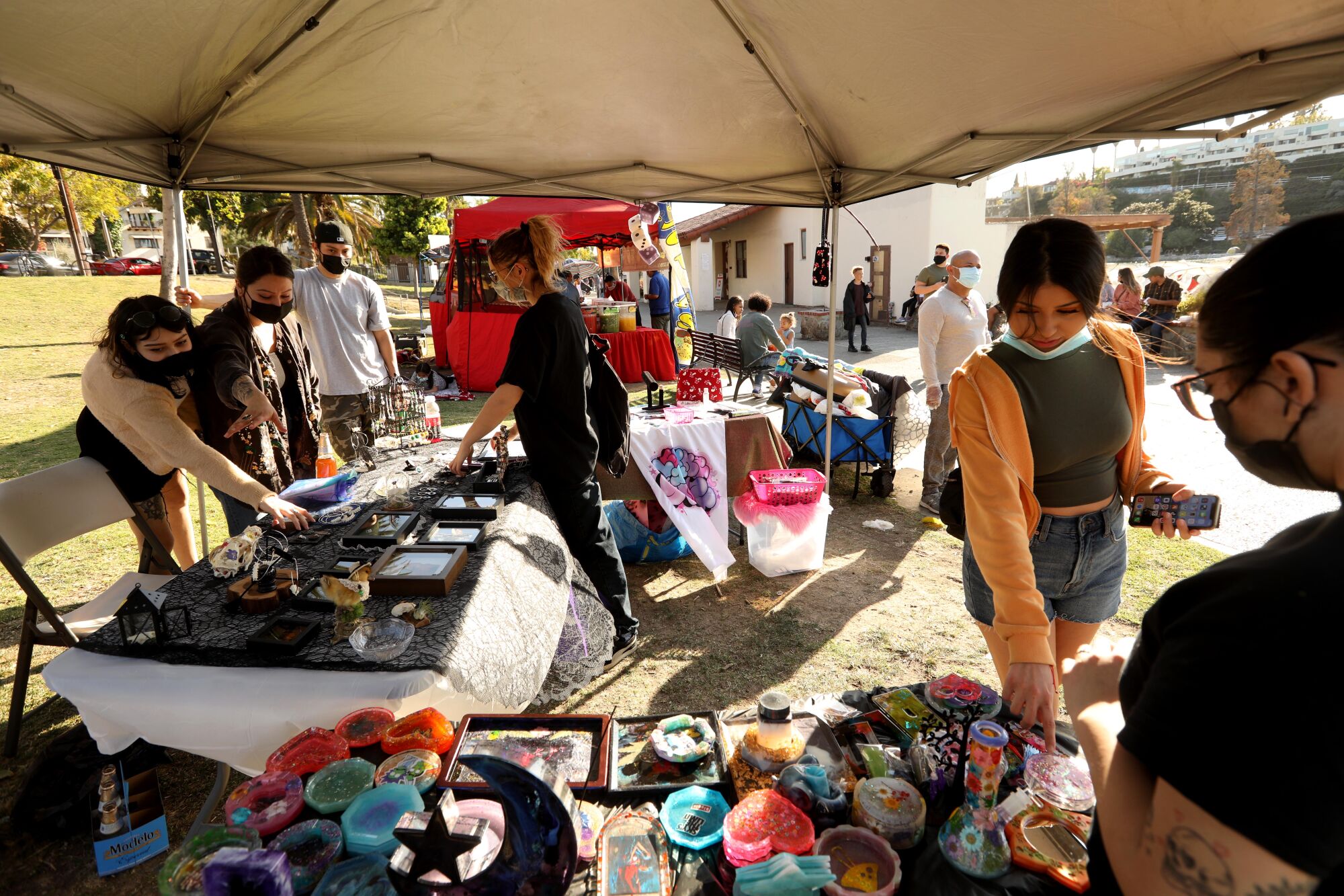 Alejandra Leal, second from left, has oddities for sale in Echo Park.