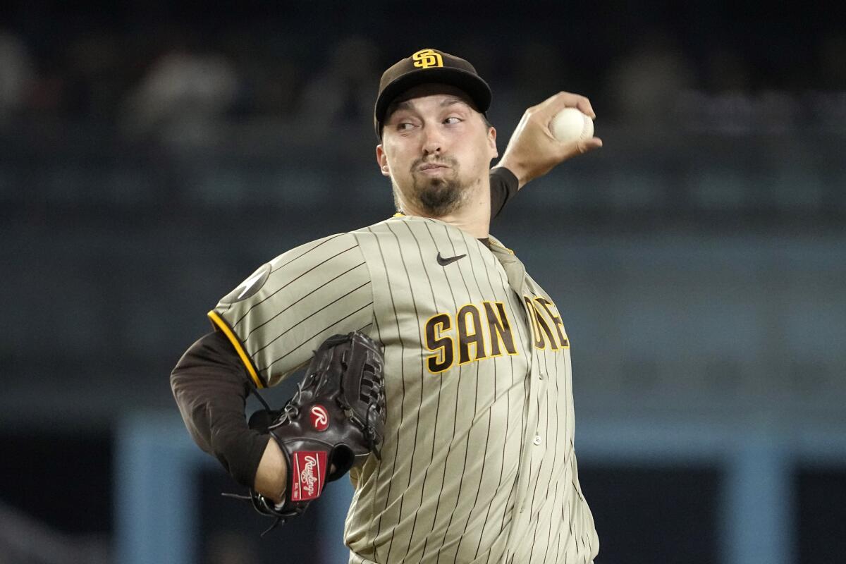 San Diego Padres pitcher Blake Snell throws to the plate.