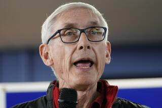 FILE - Wisconsin Democratic Gov. Tony Evers speaks at a campaign stop, Oct. 27, 2022, in Milwaukee. A man illegally brought a handgun into the Wisconsin Capitol on Wednesday, demanding to see Gov. Tony Evers, and returned at night with an assault rifle after posting bail, a spokesperson for the state said Thursday, Oct. 5, 2023, (AP Photo/Morry Gash, File)