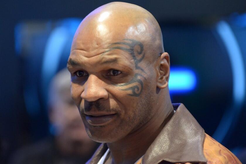 Mike Tyson is being called a hero after he came to the aid of an injured motorcyclist in Las Vegas.