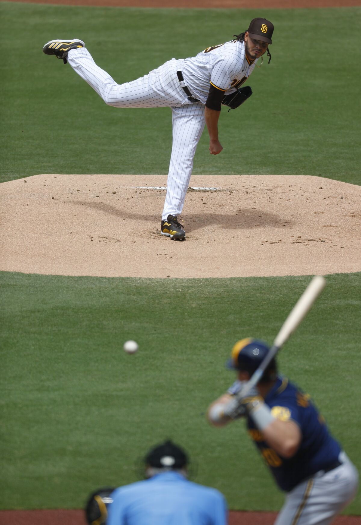 Padres pitcher Dinelson Lamet strikes out Milwaukee Brewers' Daniel Vogelbach 