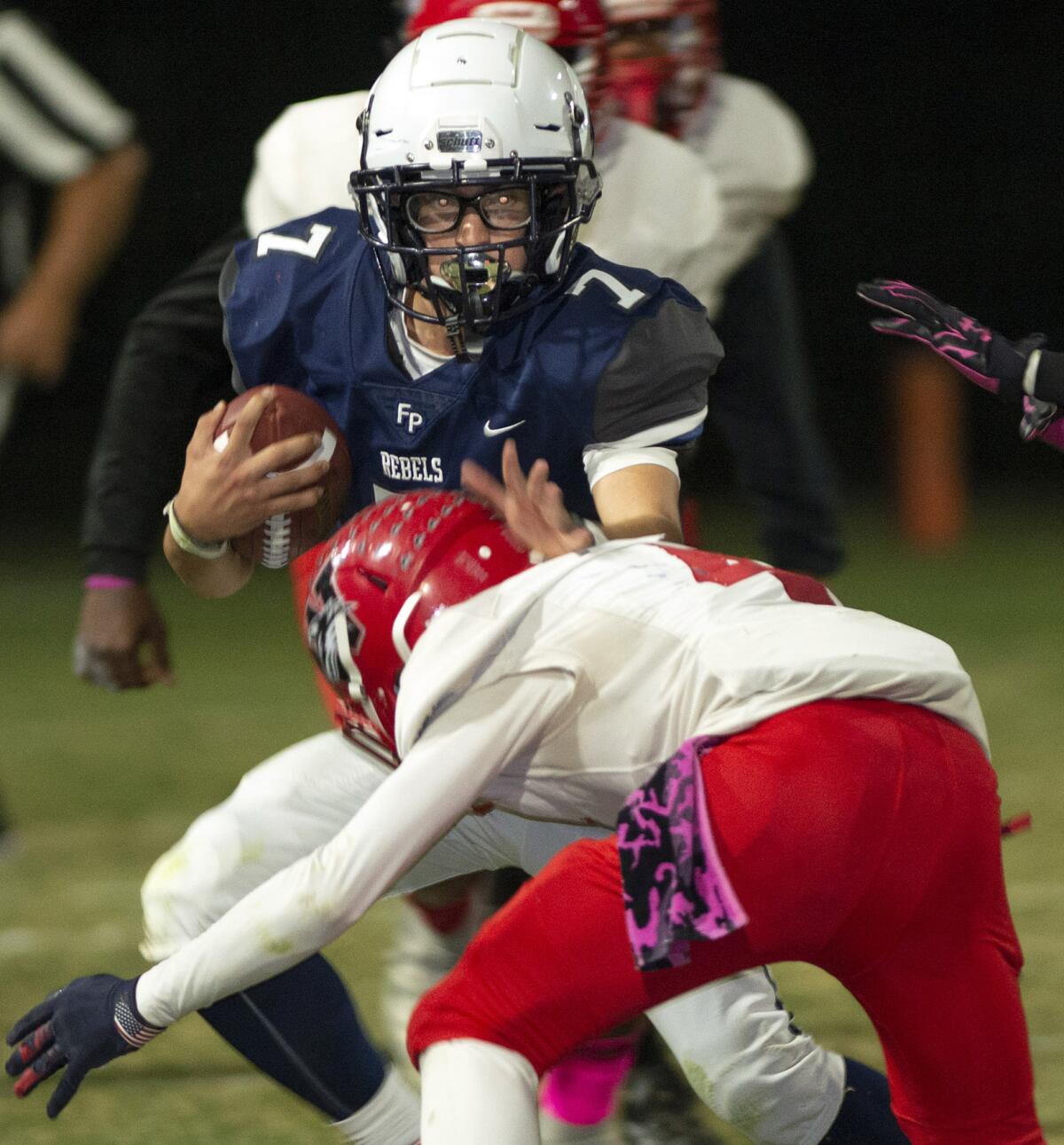 Flintridge Prep’s Alexander Payne trie to avoid Riverside County Education Academy’s Sonny Dimmick on a carry during Friday's game. (Photo by Miguel Vasconcellos)