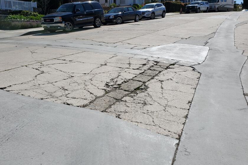 Park Row, a few blocks east of La Jolla Cove, is subject to cracks and uneven surfaces.