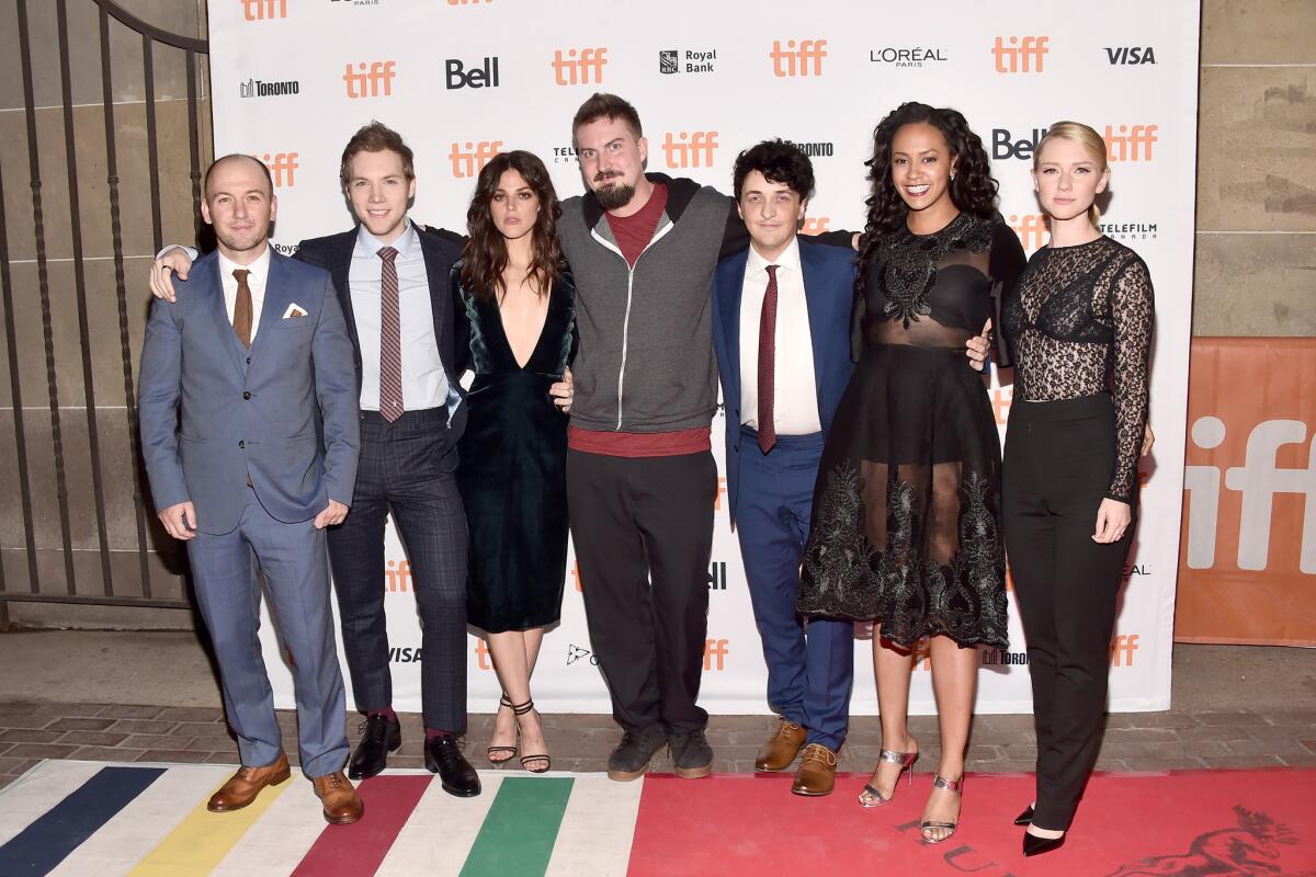 The "Blair Witch" team, from left: writer Simon Barrett, actors James Allen McCune, Callie Hernandez, director Adam Wingard, actors Wes Robinson, Corbin Reid and Valorie Curry -- at Sunday's premiere in Toronto.