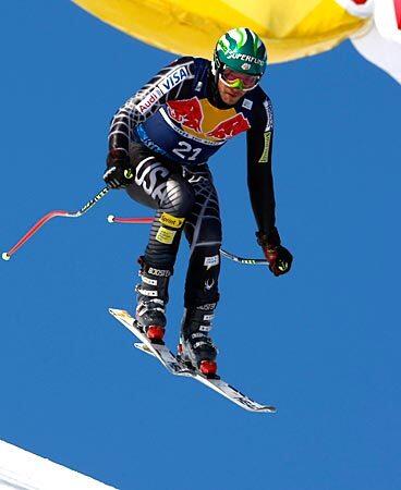 Bode Miller, the bad boy from the 2006 Games in Italy, relishes being an afterthought, and the emergence of U.S. teammate Lindsey Vonn has allowed Miller to shrink out of the spotlight heading into these Olympics with hardly an objection.