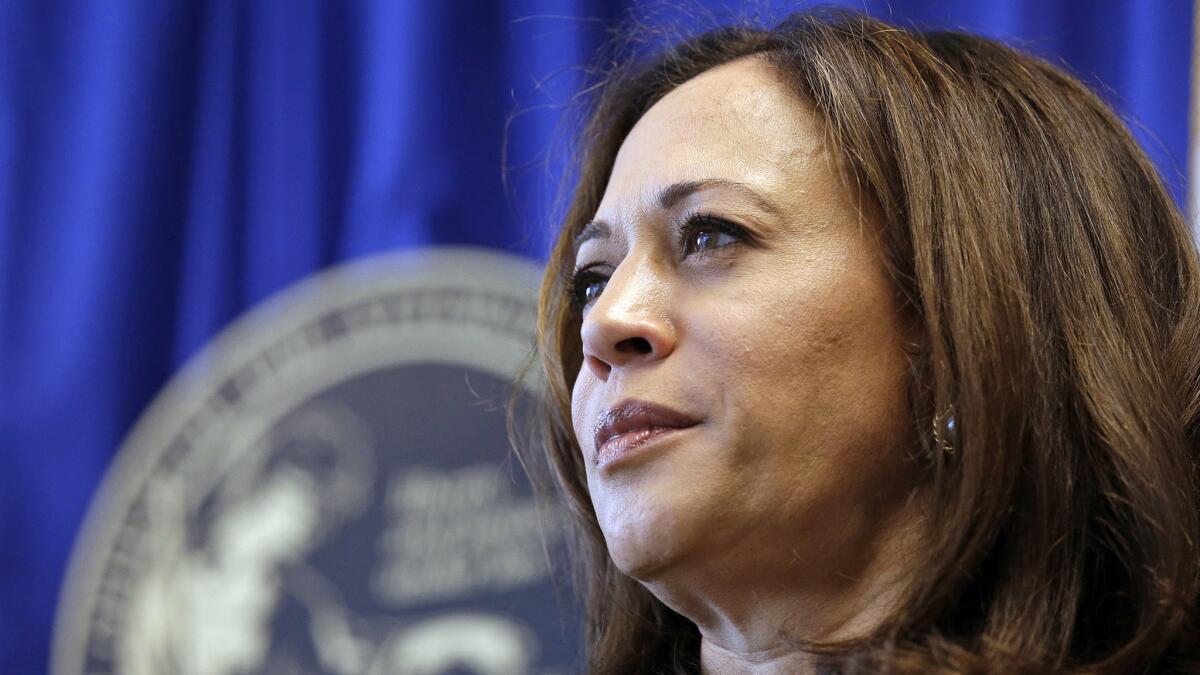 A group of reserve law enforcement officers has sued California Atty. Gen. Kamala Harris, claiming that a state bureau she oversees has wrongly denied them permission to buy semiautomatic weapons for use on the job.