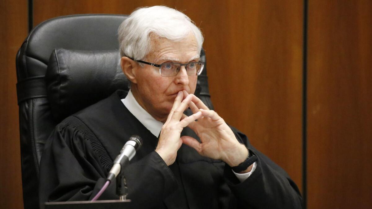 Los Angeles Superior Court Judge Robert J. Perry, shown last year, should have suspended a 2013 murder trial when doubts about the defendant's mental competency were raised, the state Supreme Court decided Monday.