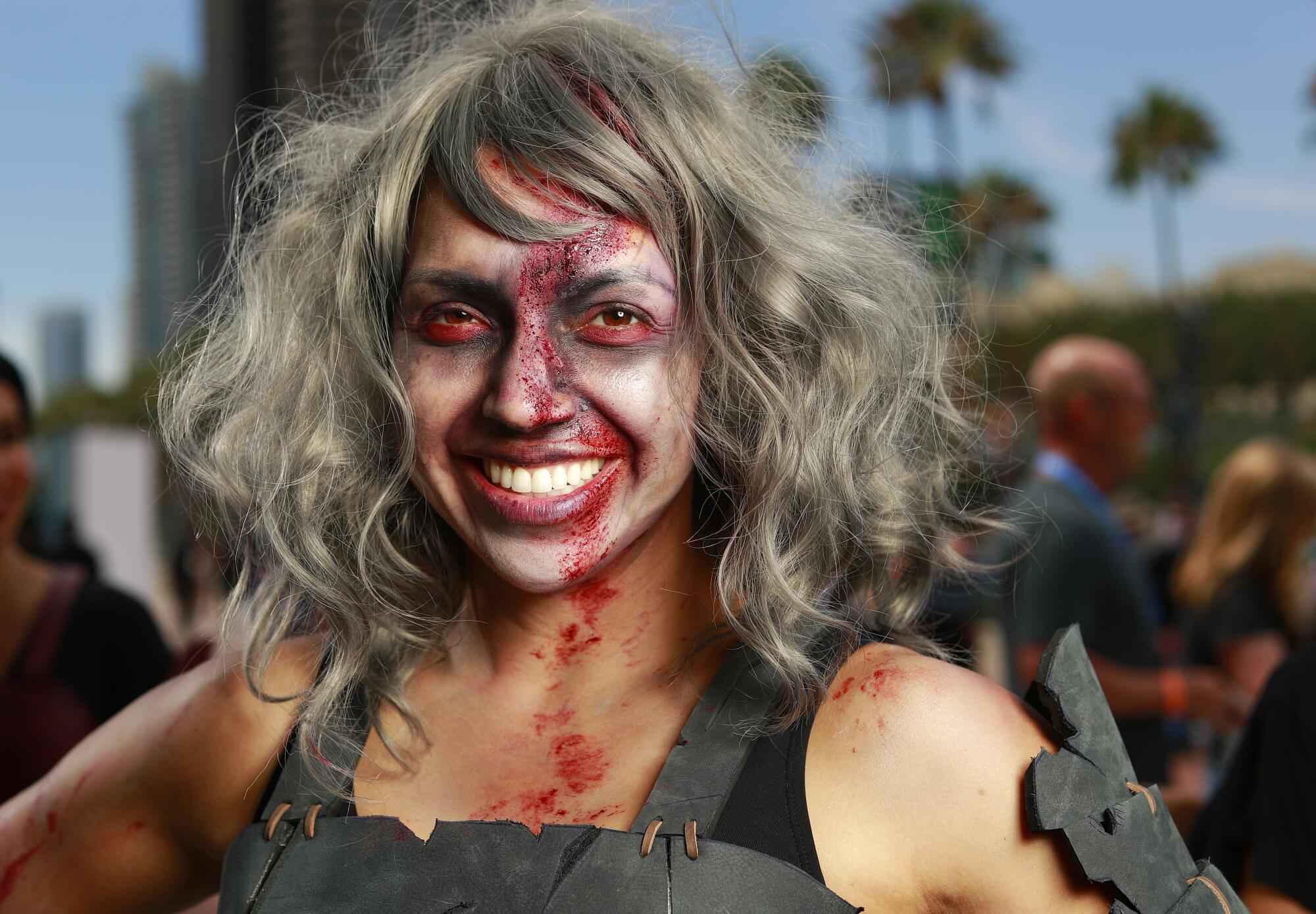 Elsy Luna of San Diego dressed as a zombie promoting the animated series "Road of Vengeance" at Comic-Con.