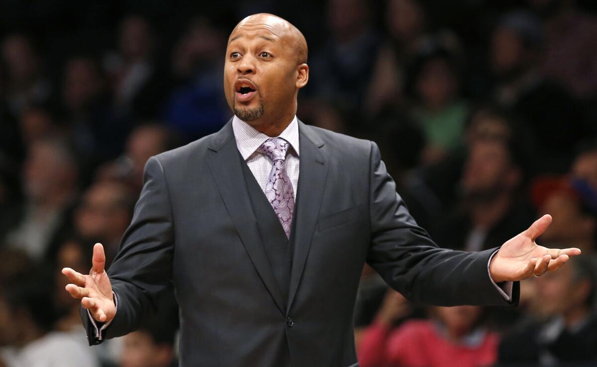 Then-Denver Nuggets coach Brian Shaw gestures during a game against the Brooklyn Nets on Dec. 23, 2014.