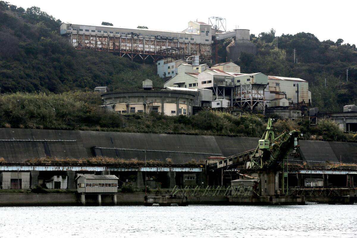 Heavy industrial buildings along the waterfront