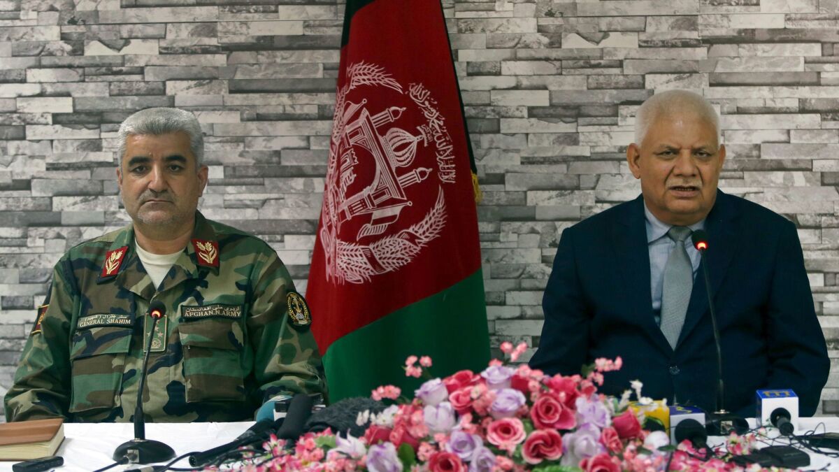 Afghanistan's Defense Minister Abdullah Habibi, right, and Army Chief of Staff Qadam Shah Shaheem give a press conference, in Kabul, Afghanistan, on April 24, 2017.