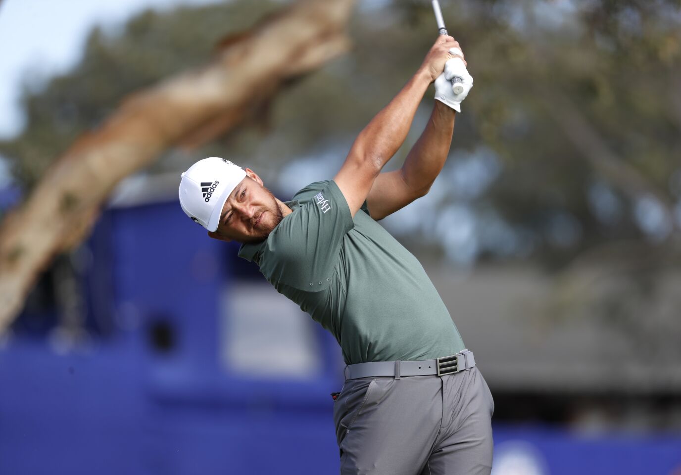 SAN DIEGO, CA - JANUARY 31: Xander Schauffele tees off on the 8th hole during final round of the Farmers Insurance Open at Torrey Pines on Sunday, Jan. 31, 2021 in San Diego, CA. (K.C. Alfred / The San Diego Union-Tribune)