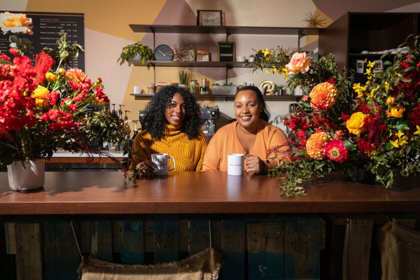 INGLEWOOD , CA - FEBRUARY 14: From Right - Shanita Nicholas and Amanda-Jane Thomas owners of Sip & Sonder coffee shop on Tuesday, Feb. 14, 2023 in Inglewood , CA. (Jason Armond / Los Angeles Times)